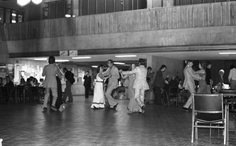 People Dancing in Pairs in The Meeting Place