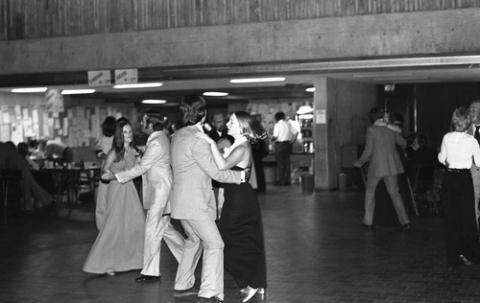 People Dancing in Pairs in The Meeting Place