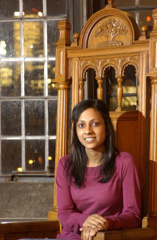 Tasha Jeyanathan, Seated in University of Toronto Ceremonial Chair, St. George Campus, Promotional Image