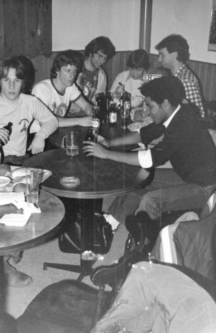 Students Seated at Bar Tables