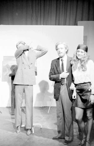 Three Costumed Students Onstage